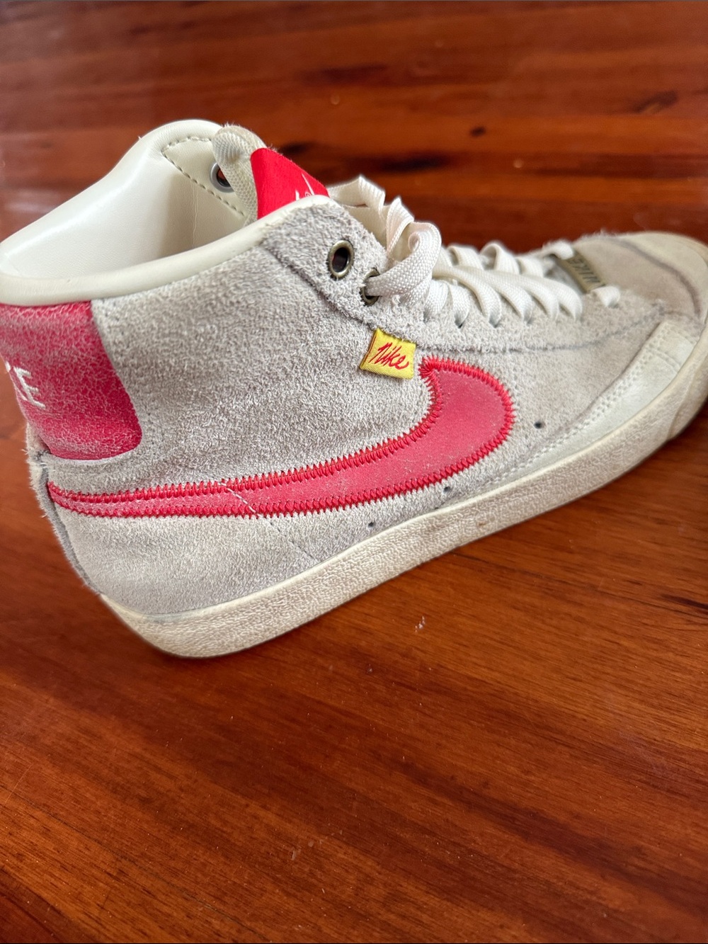 Nike Women’s High-Top Suede Sneakers in Off-White with Pink Swoosh